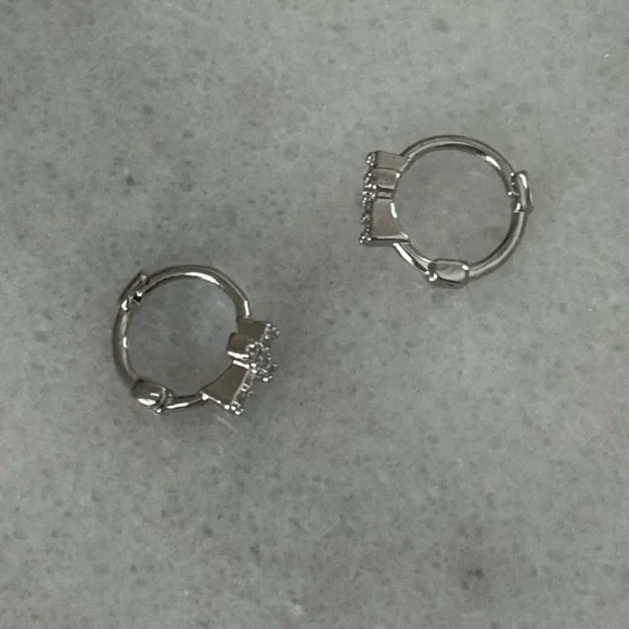 Silver Cross Crystal Small Huggie Hoop Earrings
Brand New - Picture 4 of 4
